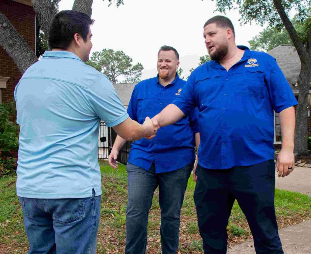 Joshua-Keith-and-Michael-Keith-with-a-customer